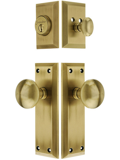 Grandeur Fifth Avenue Entry Set, Keyed Alike with Fifth Avenue Knobs in Antique Brass.
